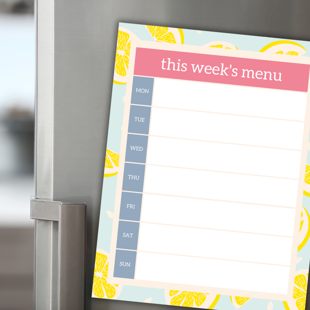 This Week's Menu printable posted on refrigerator in kitchen